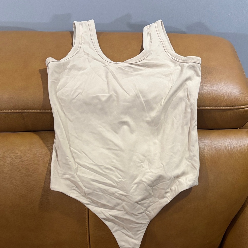 NUUDS  tan bodysuit